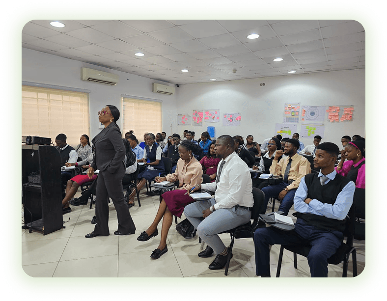 A Whiterand Business School facilitator leading a full classroom session.